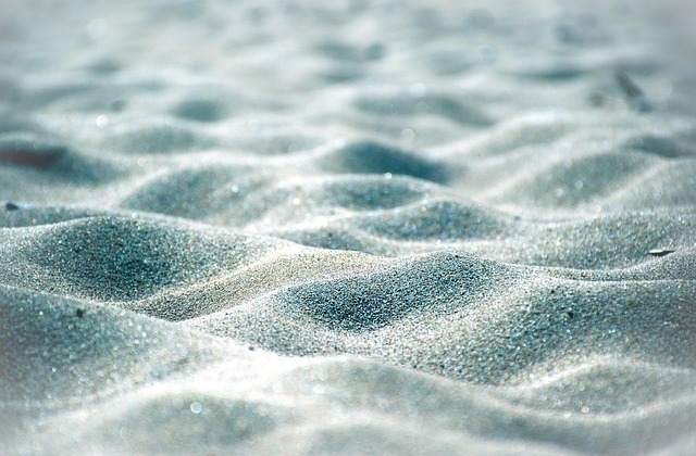 Light blue-white sand.