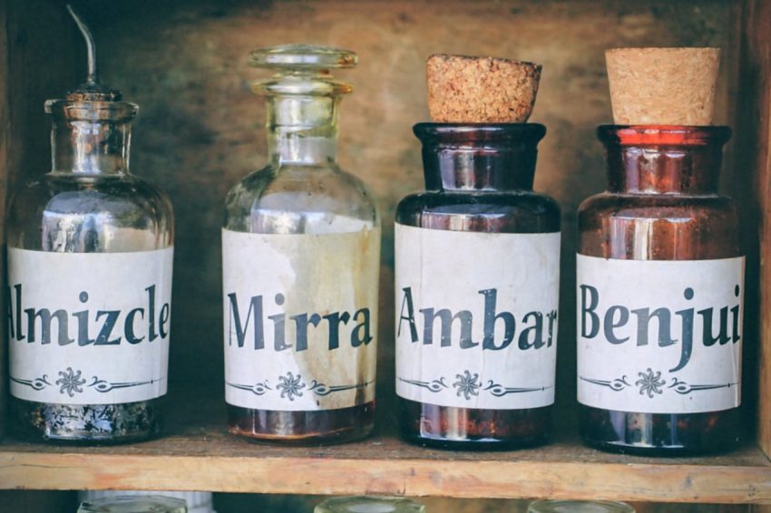 Four varied bottles of random liquids.